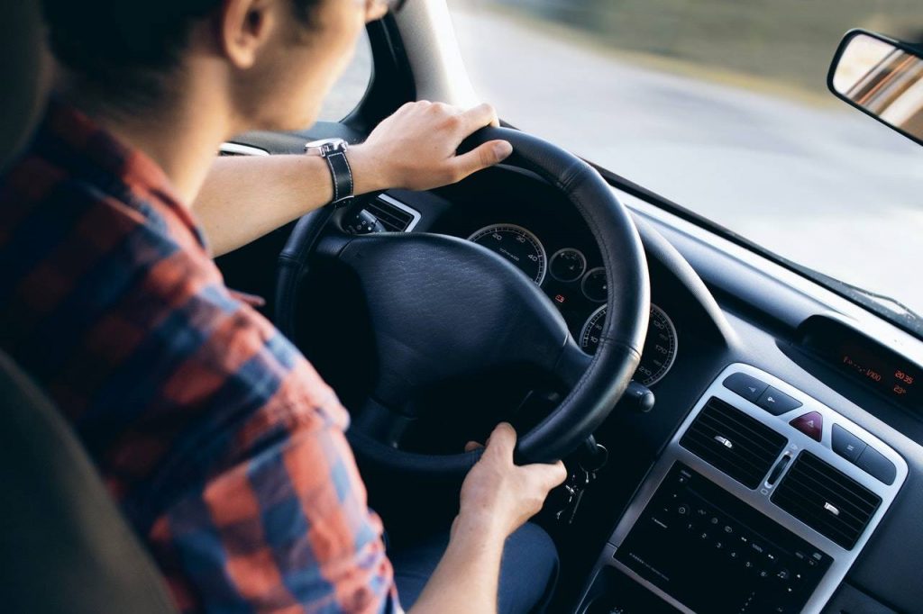 A person test driving a car - Dato Darren Yaw